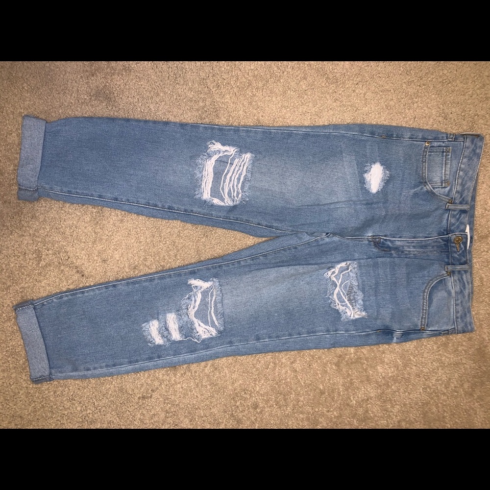 I am selling light washed ripped boyfriend jeans.
